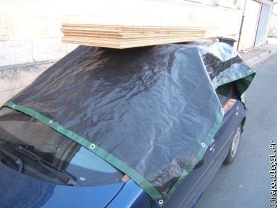 Une bache de protection, puis les plaques de 70 cm par 1,60